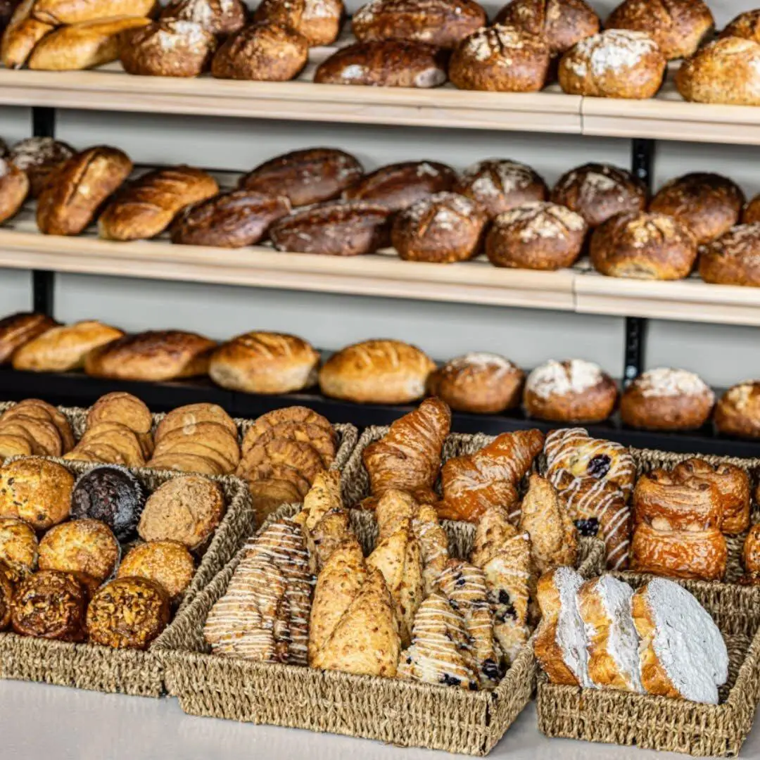 Shelves of fresh sourdough loaves and pastries at the Ellicottville Bake Shop