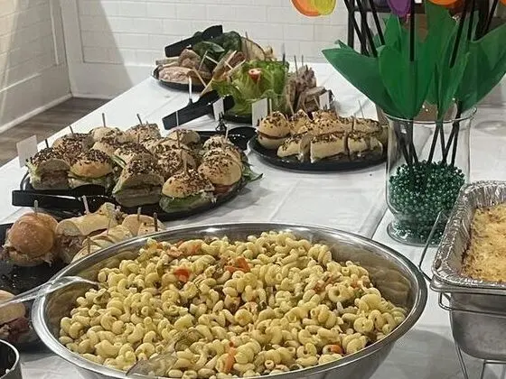 Sandwich platters and sliders on a catering buffet at Alpine Bistro